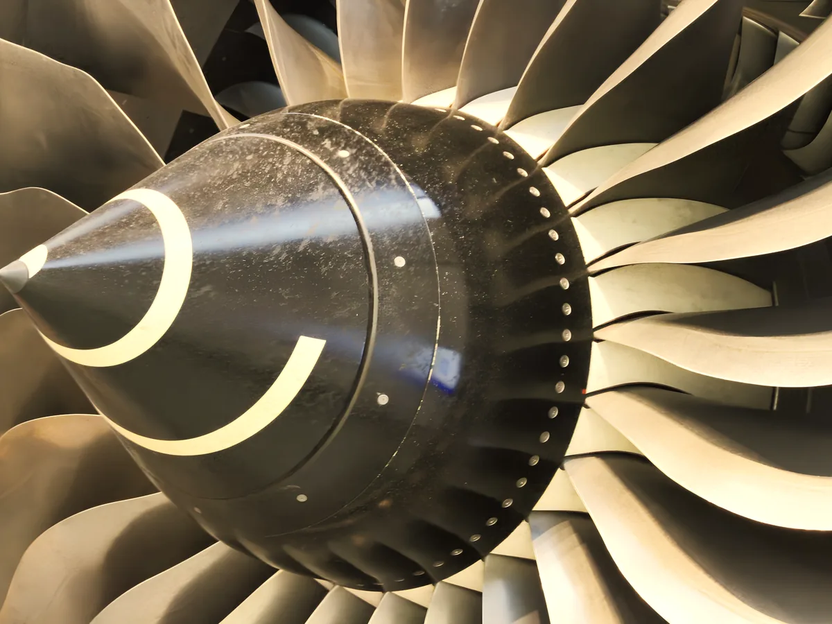 Cinematic close up of jet turbine fan blades